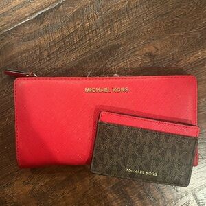 Red Micheal Kors Wallet and card holder.